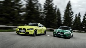 BMW M3 und BMW M4 fahrend von vorne