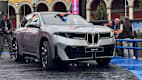 Frontansicht eines stehenden BMW iX3 auf der IAA 2025 in München