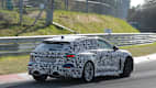 Heckansicht eines fahrenden Audi RS5