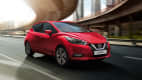 Front und Seitenansicht eines fahrenden Nissan Micra
