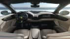 Das Cockpit und die beigen Sitze und Lenkrad mit dem gelben Ferrari Logo im neuen Purosangue