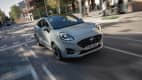 Frontansicht eines fahrenden Ford Puma nach Facelift