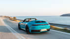 Porsche 911 Carrera S Cabrio fahrend auf der Straße