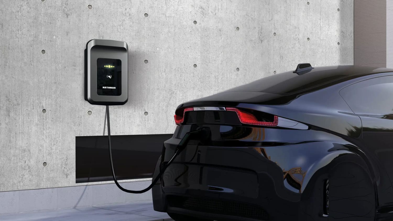 Bidirektionale Wallbox an einer Hauswand, die ein E-Auto lädt.