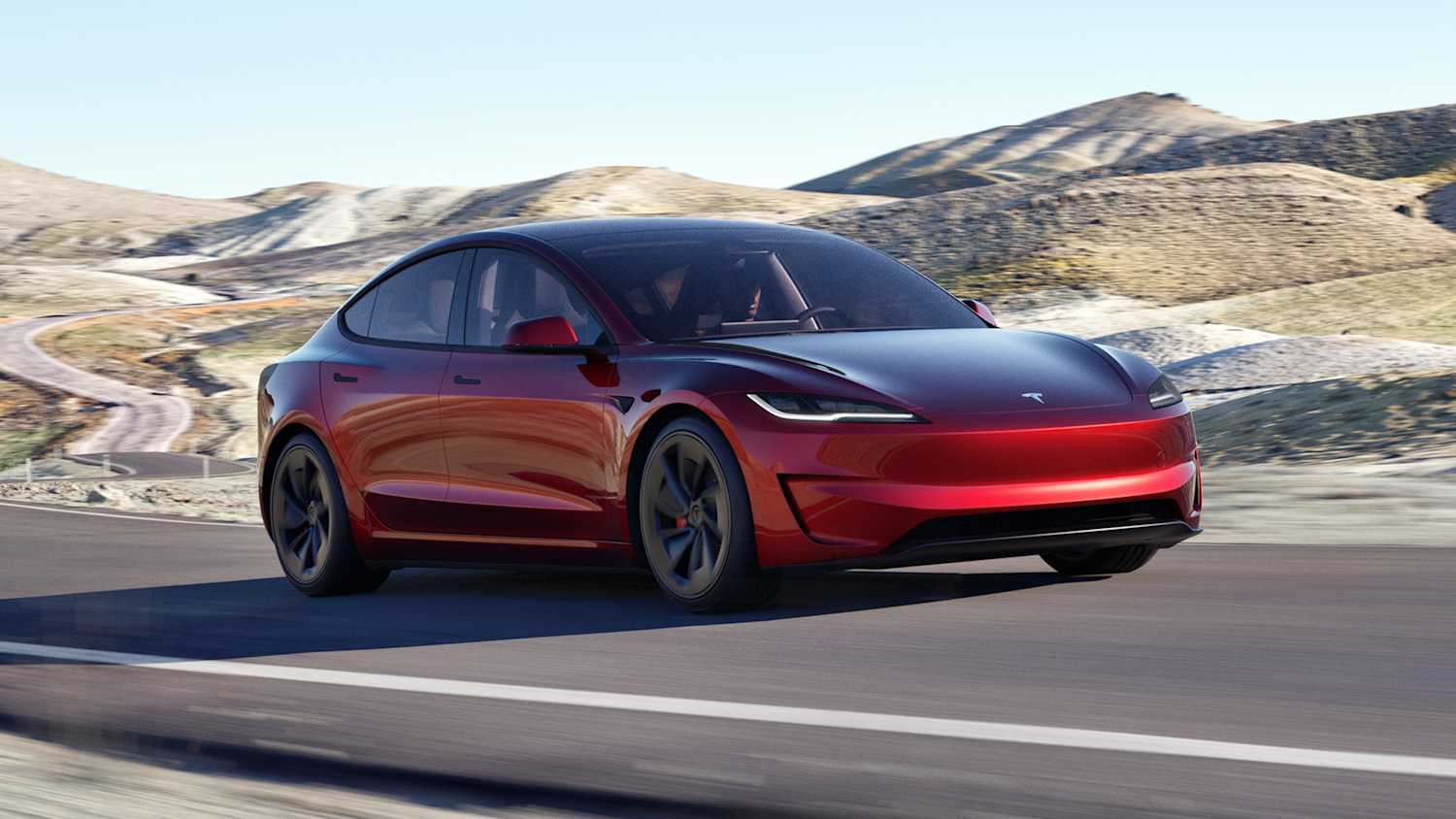 Frontansicht eines fahrenden Tesla Model 3