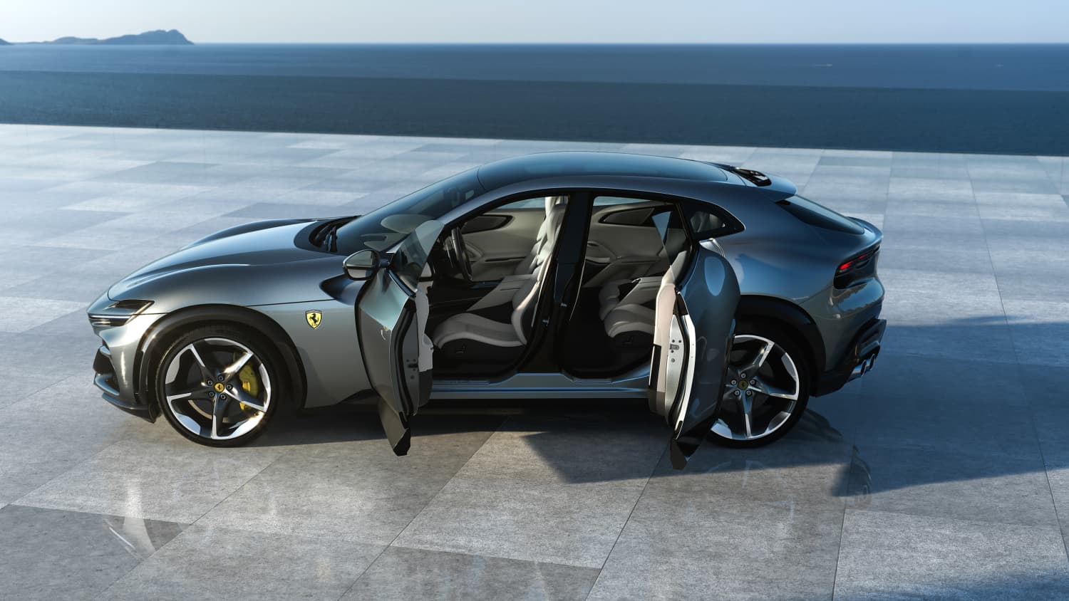 Ein grauer Ferrari Purosangue mit geöffneten Türen