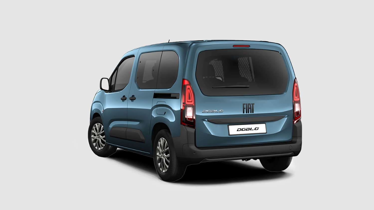 Der Fiat Doblo seitlich von hinten fotografiert
