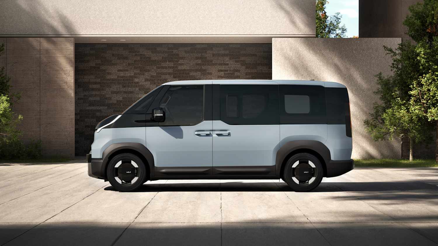Seitenansicht eines stehenden Kia PV5