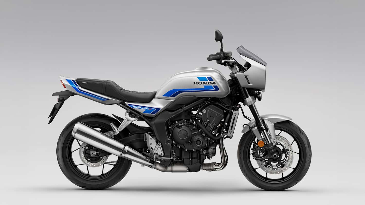 Die neue Honda CB1000F stehend seitlich zu sehen mit Lampenverkleidung