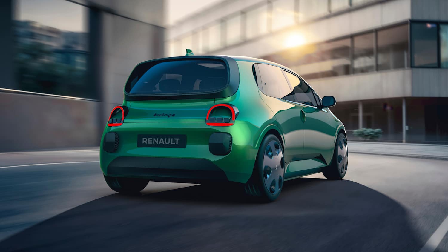 Heckansicht einer fahrenden Renault Twingo E-Tech Studie