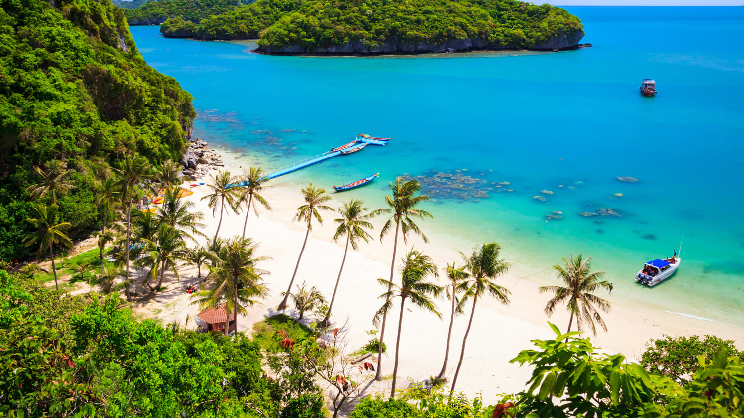 Boote am Palmenstrand von Koh Samui inThailand