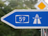 Ein Autobhanschild zeigt den Weg zur auffahrt A59
